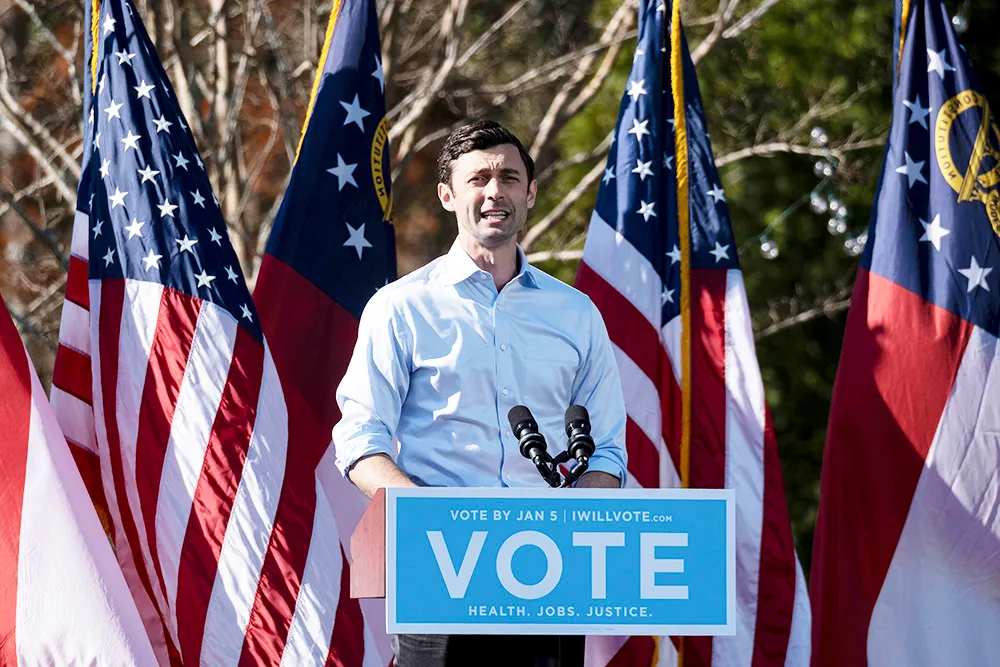 Democratic U.S. Senate challenger Jon Ossoff speaks during a rally, Monday, Dec. 21, 2020 in Columbus, Ga. with Vice President-Elect Kamala Harris and fellow Democratic U.S. Senate challenger the Rev. Raphael Warnock. (AP Photo/Ben Gray)