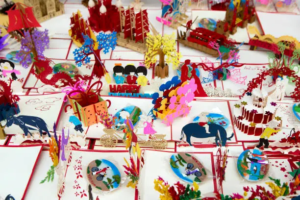 various 3D pop up cards on a table